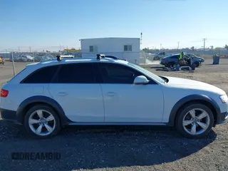 2015 Audi allroad Premium with VIN WA1TFAFL7FA117297, listed as a IAAI auction lot 41384957 with 111,653 mi miles. Bid and sale history available at carsss.com. Image 13.