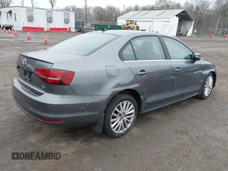 2016 Volkswagen Jetta Sedan 1.8T SEL with VIN 3VWL17AJ4GM251702, listed as a IAAI auction lot 41924085 with 93,605 mi miles. Bid and sale history available at carsss.com. Image 4.