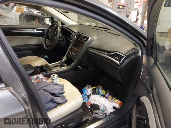 2016 Ford Fusion Titanium with VIN 3FA6P0K92GR370044, listed as a IAAI auction lot 42200799 with 95,574 mi miles and . Bid and sale history available at carsss.com. Image 5.