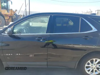2020 Chevrolet Equinox LT with VIN 2GNAXJEV7L6259159, listed as a IAAI auction lot 42439744 with 90,670 mi miles and . Bid and sale history available at DreamBid. Image 14.