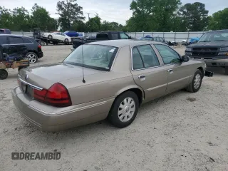 2005 Mercury Grand Marquis LS Premium z VIN 2MEFM75W15X660639, wystawiony jako Copart lot #56580605 z przebiegiem 149 136 mil mil oraz Szkody całkowita. Historia ofert i sprzedaży dostępna na DreamBid. Obrazek 3.
