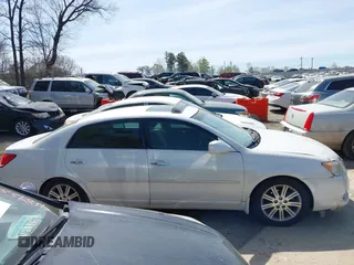 2010 Toyota Avalon XL with VIN 4T1BK3DB6AU363456, listed as a IAAI auction lot 41909395 with 251,402 mi miles and . Bid and sale history available at DreamBid. Image 13.