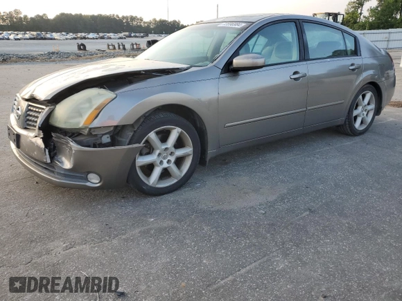 2004 Nissan Maxima SE with VIN 1N4BA41E24C878448, listed as a Copart auction lot 72596984 with 329,525 mi miles and Salvage Title. Bid and sale history available at carsss.com. Image 1.