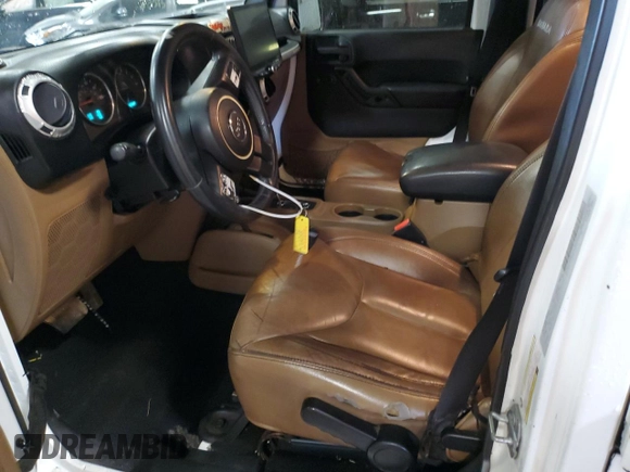 2015 Jeep Wrangler Unlimited Wrangler X with VIN 1C4HJWEG7FL671259, listed as a Copart auction lot 52334325 with 81,244 mi miles and Clean title. Bid and sale history available at DreamBid. Image 7.