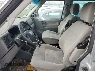 2002 Volkswagen EuroVan MV с VIN WV2MB47072H002990, выставлен на аукционе Copart как лот 85223854 с пробегом 153 893 миль миль и Чистый • Clean title. История ставок и продаж доступна на DreamBid. Изображение 7.