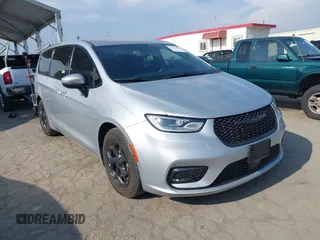 2023 Chrysler Pacifica Hybrid Touring L with VIN 2C4RC1L74PR593522, listed as a IAAI auction lot 42174969 with 82,887 mi miles and . Bid and sale history available at DreamBid. Image 1.