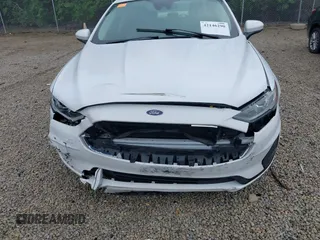 2020 Ford Fusion SE with VIN 3FA6P0LU5LR151074, listed as a IAAI auction lot 42146290 with 98,574 mi miles and . Bid and sale history available at carsss.com. Image 6.