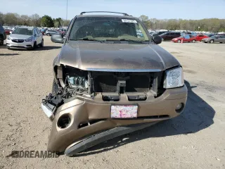 2003 GMC Envoy SLT z VIN 1GKDS13S032134647, wystawiony jako Copart lot #50137325 z przebiegiem 217 878 mil mil oraz Szkody całkowita. Historia ofert i sprzedaży dostępna na DreamBid. Obrazek 5.