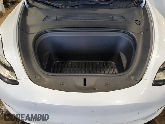 2022 Tesla Model Y Long Range z VIN 7SAYGDEEXNA012904, wystawiony jako Copart lot #57492865 z przebiegiem 31 294 mil mil oraz Szkody całkowita. Historia ofert i sprzedaży dostępna na DreamBid. Obrazek 11.
