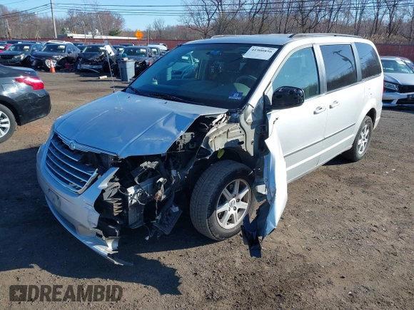 2010 Chrysler Town & Country Touring with VIN 2A4RR5D14AR359169, listed as a IAAI auction lot 41900856 with 204,595 mi miles and . Bid and sale history available at DreamBid. Image 6.