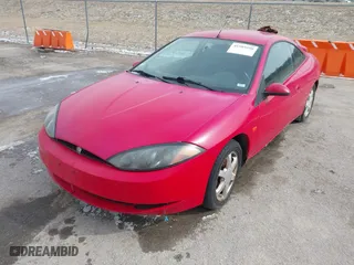 1999 Mercury Cougar with VIN 1ZWHT61L5X5629944, listed as a IAAI auction lot 41589590 with 90,999 mi miles. Bid and sale history available at carsss.com. Image 2.