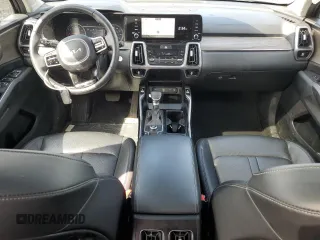 2023 Kia Sorento EX z VIN 5XYRH4LFXPG203750, wystawiony jako Copart lot #54191305 z przebiegiem 54 320 mil mil oraz Szkoda całkowita • Salvage title. Historia ofert i sprzedaży dostępna na DreamBid. Obrazek 8.