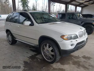 2004 BMW X5 3.0i with VIN 5UXFA13524LU42043, listed as a IAAI auction lot 41711522 with 210,972 mi miles. Bid and sale history available at carsss.com. Image 1.