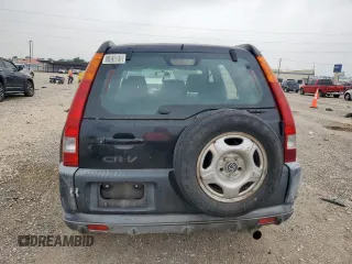 2002 Honda CR-V LX z VIN JHLRD68472C024693, wystawiony jako Copart lot #57076495 z przebiegiem 294 743 mil mil oraz Czysty tytuł • Clean title. Historia ofert i sprzedaży dostępna na DreamBid. Obrazek 6.