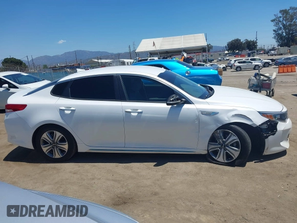 2017 Kia Optima EX z VIN KNAGV4LD9H5013282, wystawiony jako IAAI lot #42218247 z przebiegiem 63 878 mil mil oraz . Historia ofert i sprzedaży dostępna na DreamBid. Obrazek 13.