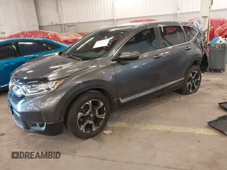 2018 Honda CR-V Touring with VIN 2HKRW2H91JH634457, listed as a IAAI auction lot 41697658 with 101,878 mi miles. Bid and sale history available at carsss.com. Image 18.
