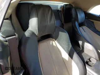 2007 Aston Martin DB9 z VIN SCFAD02A47GB07685, wystawiony jako Copart lot #75868414 z przebiegiem Nie podano mil oraz Szkody całkowita. Historia ofert i sprzedaży dostępna na DreamBid. Obrazek 10.