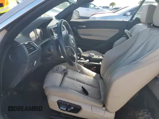 2020 BMW 2 Series 230i with VIN WBA2M7C02L7D87129, listed as a Copart auction lot 73876264 with 0 mi miles and Salvage Title. Bid and sale history available at carsss.com. Image 7.