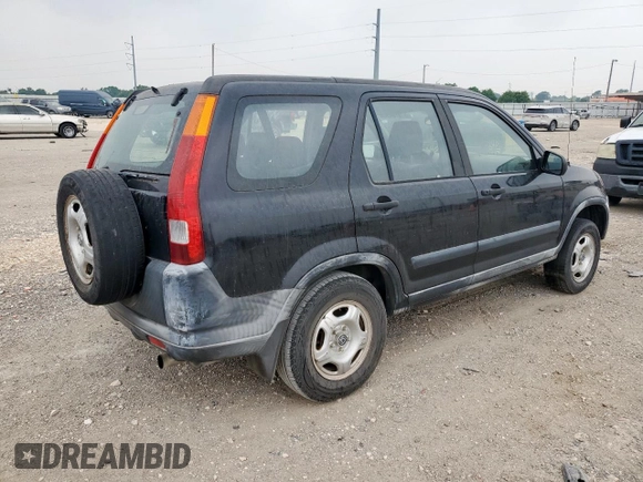 2002 Honda CR-V LX z VIN JHLRD68472C024693, wystawiony jako Copart lot #57076495 z przebiegiem 294 743 mil mil oraz Czysty tytuł • Clean title. Historia ofert i sprzedaży dostępna na DreamBid. Obrazek 3.