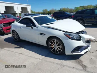 2017 Mercedes-Benz SLC 43 AMG with VIN WDDPK6GA2HF132038, listed as a IAAI auction lot 41737706 with 84,002 mi miles and . Bid and sale history available at DreamBid. Image 1.