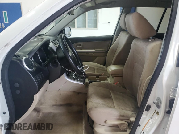 2013 Suzuki Grand Vitara Premium with VIN JS3TD0D64D4100568, listed as a Copart auction lot 63958985 with 140,668 mi miles and Salvage title. Bid and sale history available at DreamBid. Image 7.