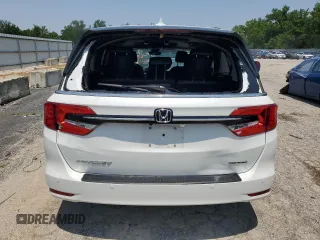 2023 Honda Odyssey Touring with VIN 5FNRL6H84PB016614, listed as a Copart auction lot 59336585 with 36,932 mi miles and Salvage title. Bid and sale history available at DreamBid. Image 6.