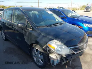2012 Nissan Versa S with VIN 3N1BC1CP3CL360582, listed as a IAAI auction lot 41773403 with 148,525 mi miles. Bid and sale history available at carsss.com. Image 1.