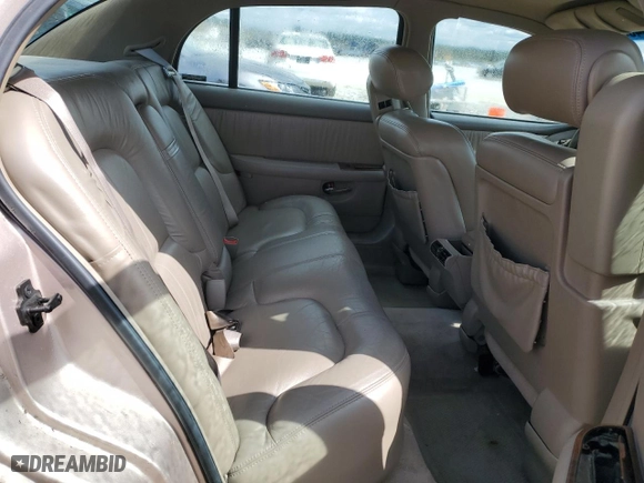 1999 Buick Park Avenue with VIN 1G4CW52KXX4639895, listed as a Copart auction lot 49435634 with 202,463 mi miles and Salvage Title. Bid and sale history available at carsss.com. Image 10.