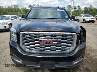 2019 GMC Yukon Denali with VIN 1GKS1CKJ0KR259491, listed as a Copart auction lot 51071335 with 105,294 mi miles and Salvage Title. Bid and sale history available at carsss.com. Image 5.