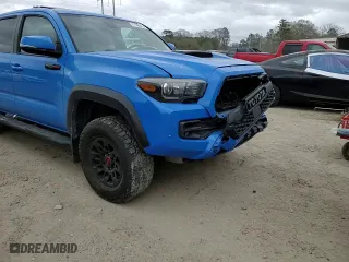 2019 Toyota Tacoma 4WD SR with VIN 5TFCZ5AN1KX185793, listed as a Copart auction lot 47190905 with 129,430 mi miles and Salvage Title. Bid and sale history available at carsss.com. Image 10.