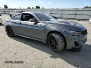 2015 BMW M4 with VIN WBS3R9C5XFF708690, listed as a Copart auction lot 54951254 with 42,105 mi miles and Salvage Title. Bid and sale history available at carsss.com. Image 4.
