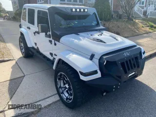 2014 Jeep Wrangler Unlimited Sahara with VIN 1C4BJWEG1EL272951, listed as a Copart auction lot 52157145 with 56,989 mi miles and Clean Title. Bid and sale history available at carsss.com. Image 1.