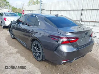 2022 Toyota Camry SE with VIN 4T1T11AK3NU619882, listed as a IAAI auction lot 41866164 with 60,620 mi miles and . Bid and sale history available at DreamBid. Image 3.