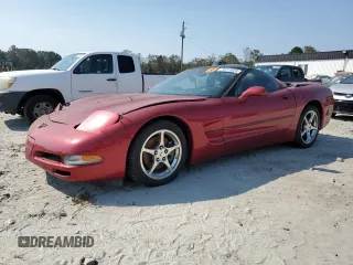 2004 Chevrolet Corvette with VIN 1G1YY22GX45114770, listed as a Copart auction lot 74711824 with 24,104 mi miles and Salvage Title. Bid and sale history available at carsss.com. Image 1.