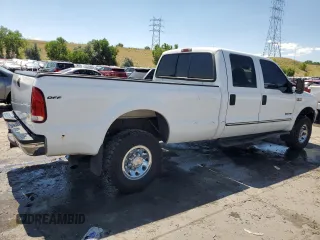 2000 Ford F-350 XL with VIN 3FTSW31F9YMA56877, listed as a Copart auction lot 62733624 with 120,595 mi miles and Salvage Title. Bid and sale history available at DreamBid. Image 3.