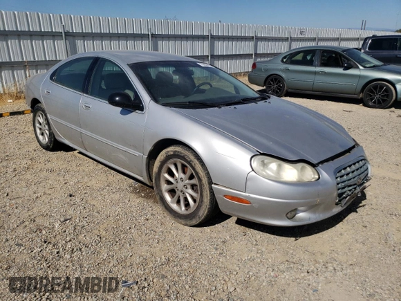 2001 Chrysler LHS z VIN 2C3HC56G11H643759, wystawiony jako Copart lot #70924974 z przebiegiem 124 263 mil mil oraz Tytuł czysty. Historia ofert i sprzedaży dostępna na DreamBid. Obrazek 4.