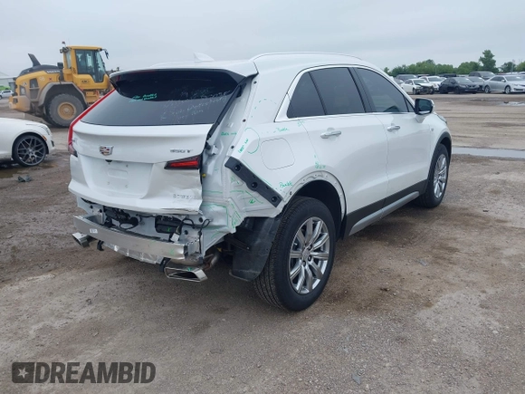 2023 Cadillac XT4 FWD Premium Luxury with VIN 1GYFZCR49PF225817, listed as a IAAI auction lot 42408494 with 5,977 mi miles and . Bid and sale history available at DreamBid. Image 4.
