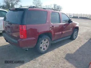 2007 GMC Yukon SLE with VIN 1GKFK13077J204048, listed as a IAAI auction lot 42052206 with 273,197 mi miles. Bid and sale history available at carsss.com. Image 4.
