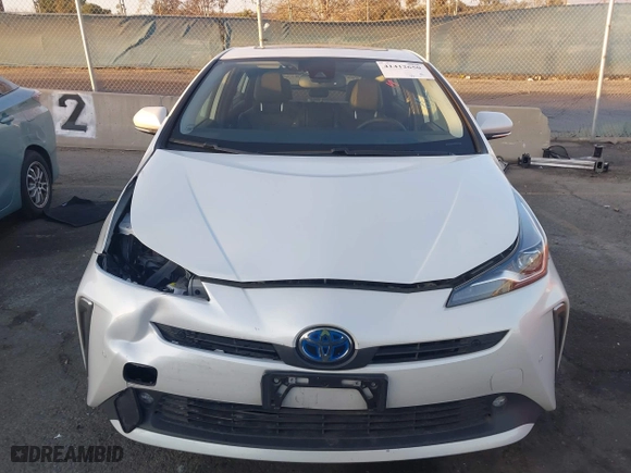 2022 Toyota Prius L Eco with VIN JTDKAMFU1N3181302, listed as a IAAI auction lot 41412650 with 92,397 mi miles. Bid and sale history available at carsss.com. Image 13.