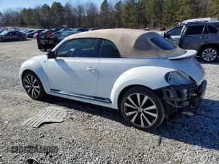 2015 Volkswagen Beetle with VIN 3VW7S7AT1FM818382, listed as a Copart auction lot 41666205 with 47,429 mi miles and Salvage Title. Bid and sale history available at DreamBid. Image 2.