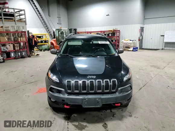 2014 Jeep Cherokee Trailhawk with VIN 1C4PJMBS5EW294212, listed as a Copart auction lot 88816885 with 151,779 mi miles and Salvage title. Bid and sale history available at DreamBid. Image 12.