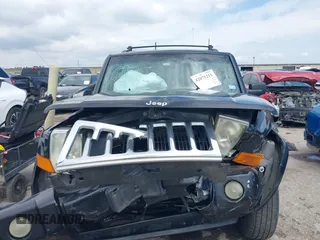 2008 Jeep Commander Sport with VIN 1J8HH48KX8C167462, listed as a IAAI auction lot 42075211 with 183,981 mi miles and . Bid and sale history available at DreamBid. Image 12.