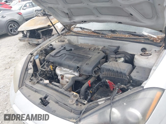 2008 Hyundai Tiburon GS z VIN KMHHM66D68U264666, wystawiony jako IAAI lot #41970123 z przebiegiem 186 448 mil mil oraz . Historia ofert i sprzedaży dostępna na DreamBid. Obrazek 10.