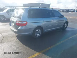 2006 Honda Odyssey EX-L with VIN 5FNRL386X6B018587, listed as a IAAI auction lot 41725966 with 168,215 mi miles. Bid and sale history available at carsss.com. Image 4.