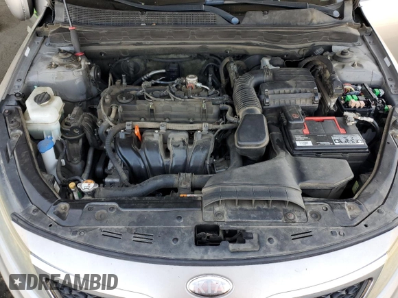 2013 Kia Optima LX z VIN 5XXGM4A74DG156035, wystawiony jako Copart lot #59358245 z przebiegiem 136 540 mil mil oraz Szkoda całkowita • Salvage title. Historia ofert i sprzedaży dostępna na DreamBid. Obrazek 11.