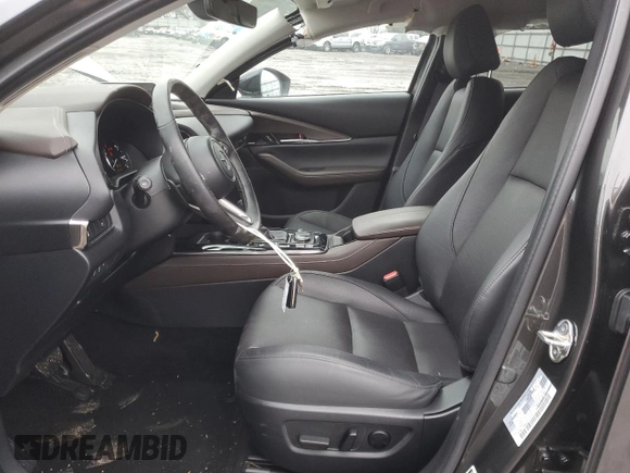 2023 Mazda CX-30 Premium with VIN 3MVDMBDYXPM555206, listed as a Copart auction lot 88027515 with 8,532 mi miles and Salvage title. Bid and sale history available at DreamBid. Image 7.