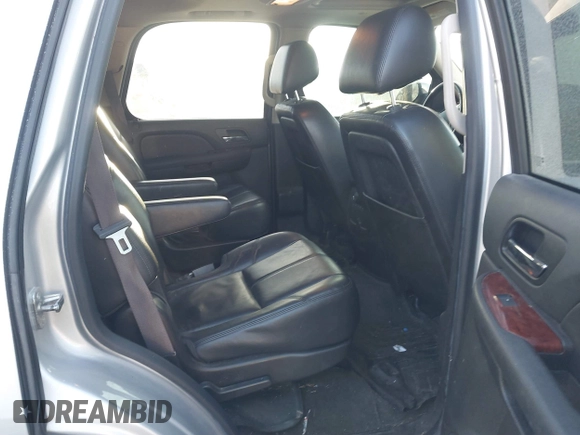 2014 GMC Yukon SLT with VIN 1GKS2CE00ER225071, listed as a IAAI auction lot 41581341 with 113,212 mi miles. Bid and sale history available at carsss.com. Image 8.