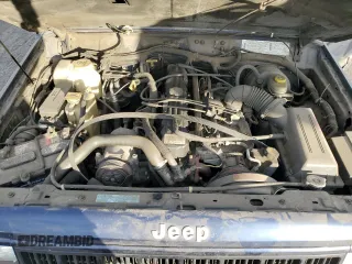 1996 Jeep Cherokee Sport with VIN 1J4FT68S4TL333342, listed as a Copart auction lot 41664965 with 185,199 mi miles and Clean Title. Bid and sale history available at carsss.com. Image 12.