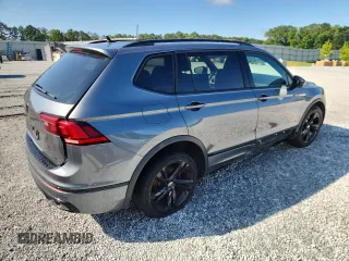 2023 Volkswagen Tiguan SE R-Line Black with VIN 3VVCB7AX3PM056471, listed as a Copart auction lot 60679225 with 94,752 mi miles and Clean title. Bid and sale history available at DreamBid. Image 3.