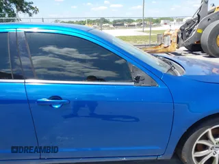 2011 Ford Fusion SE with VIN 3FAHP0HA3BR188260, listed as a IAAI auction lot 42036507 with 185,177 mi miles. Bid and sale history available at carsss.com. Image 12.